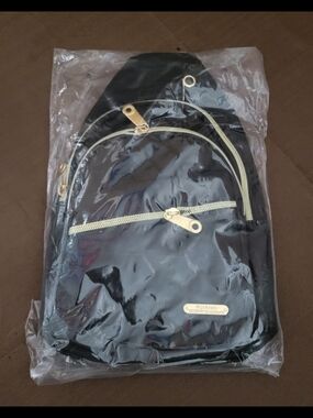 Quilted Black Women's Sling Bag with Gold Accents